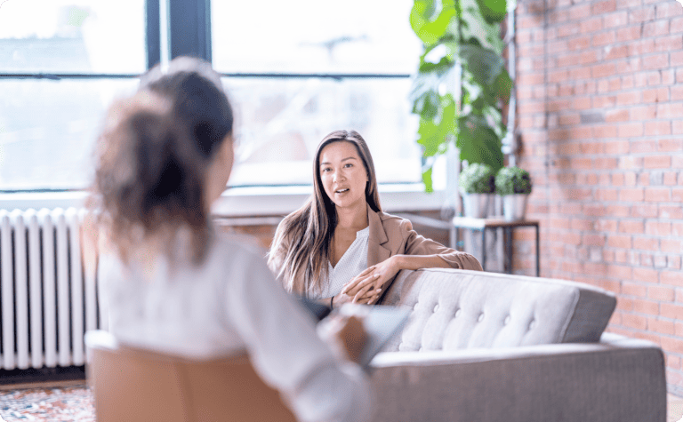 A women in a anxiety therapy session with a counselor,